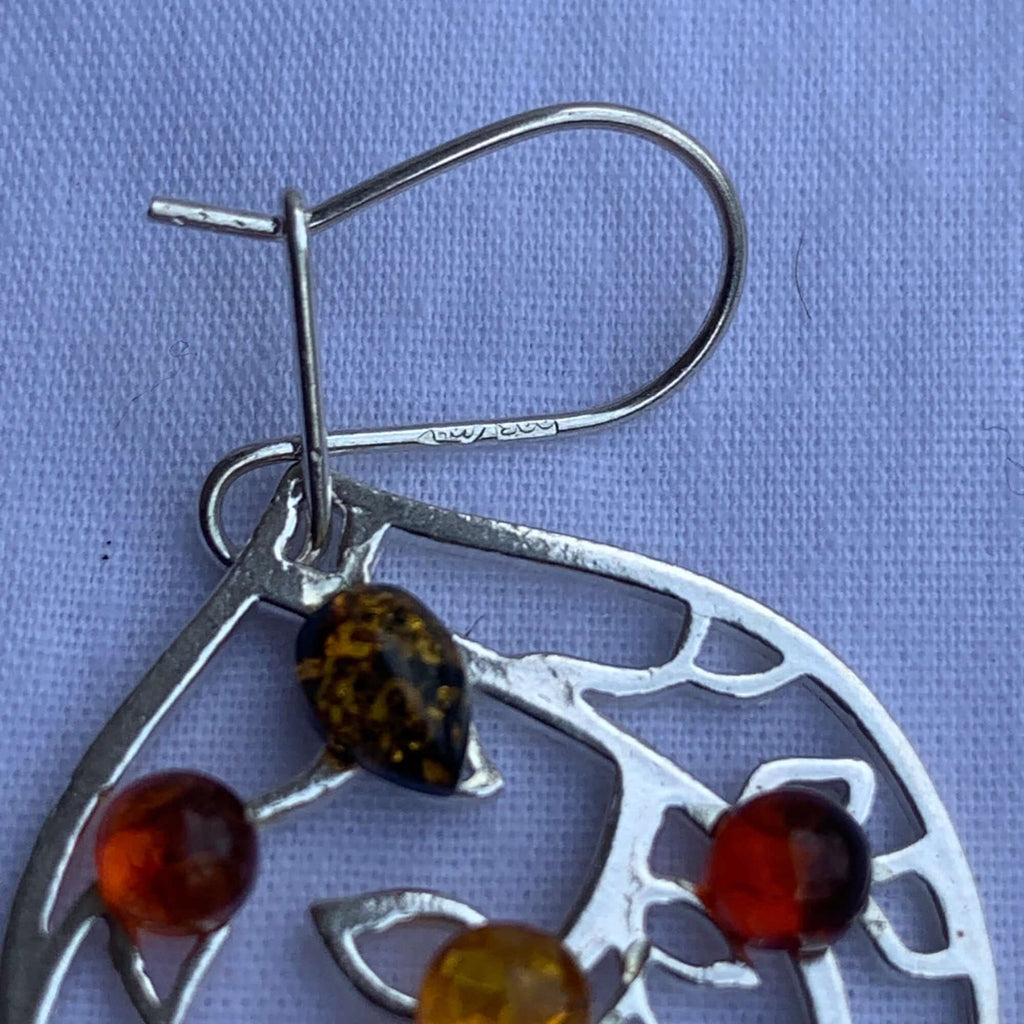 Sterling silver 925 drop dangle earring with intricate leaf design and multi-colored amber stones including cognac, green, and yellow.