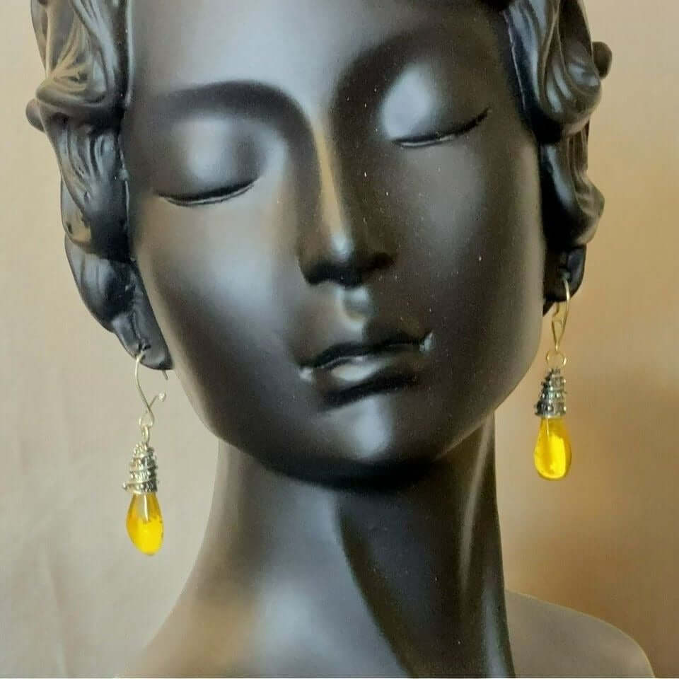 Sterling Silver 925 Womens Yellow Amber Dangle Earrings on mannequin, birthstone jewelry, silver jewelry, drop earrings, baltic amber