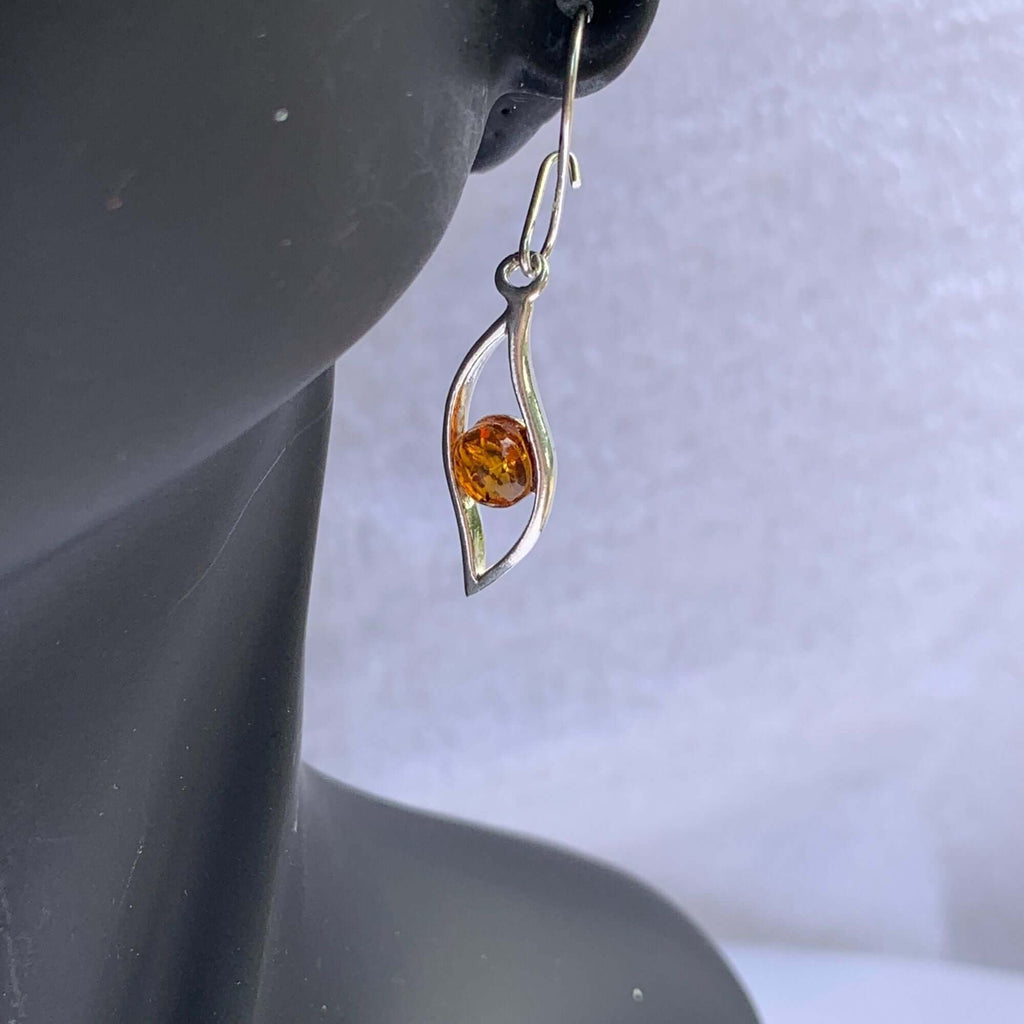 Sterling Silver 925 Cognac Amber and Silver Leaf Pattern Dangle Earrings on display mannequin