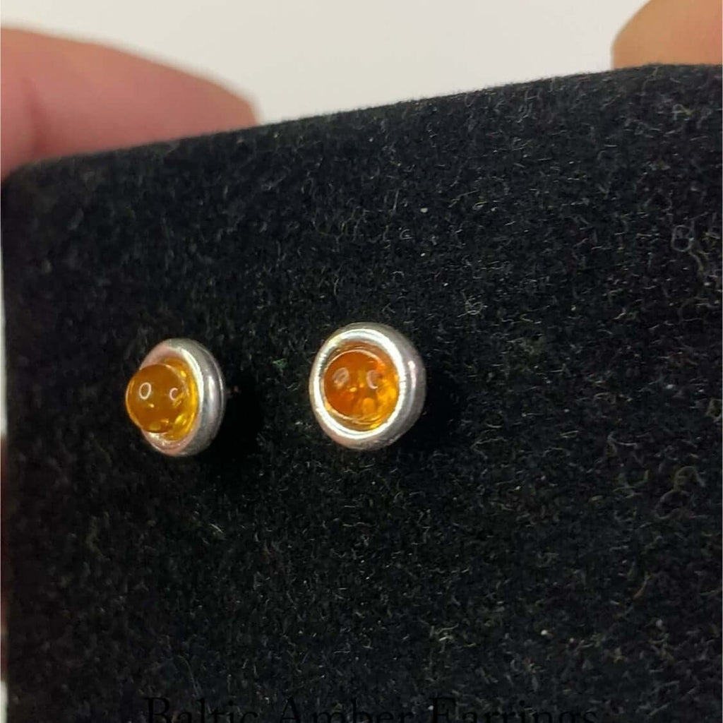 Sterling Silver 925 Women's Round Cognac Amber Stud Earrings featuring beautiful amber stones in a silver setting, perfect for elegant fashion.