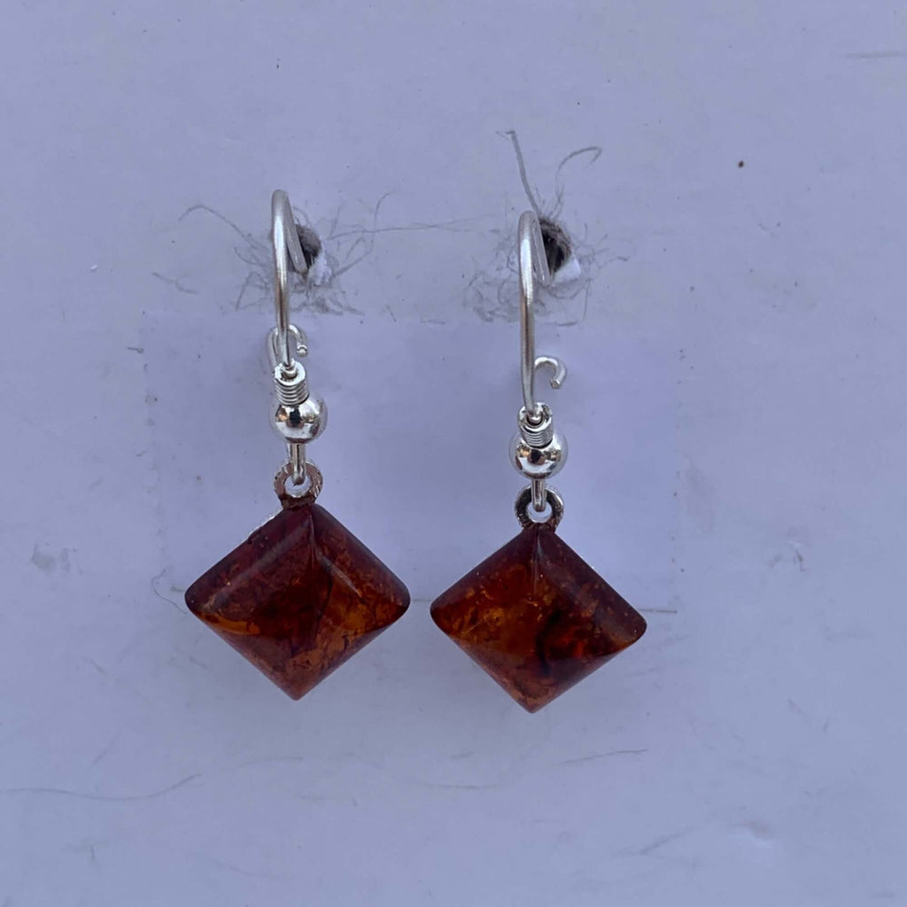 Sterling silver 925 diamond-shaped Baltic amber drop dangle earrings with delicate silver ball accents for womens fashion.